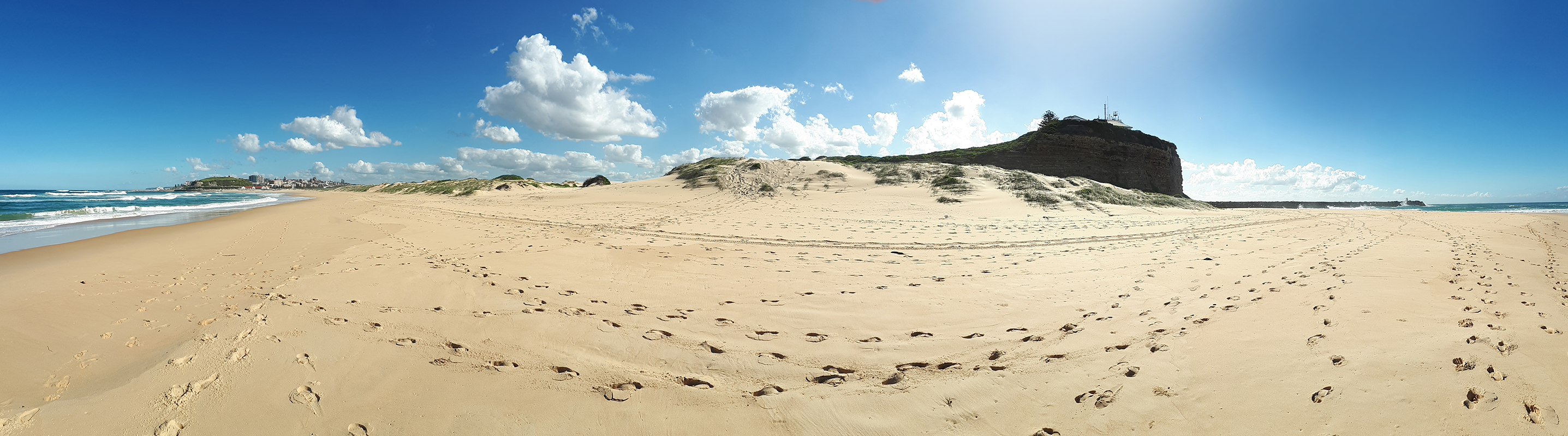 photograph panorama of nobody's head and beach in newcastle australia